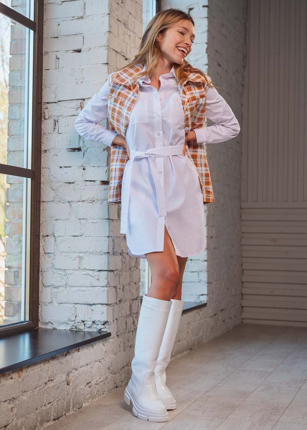 Теплий жилет з кишенями