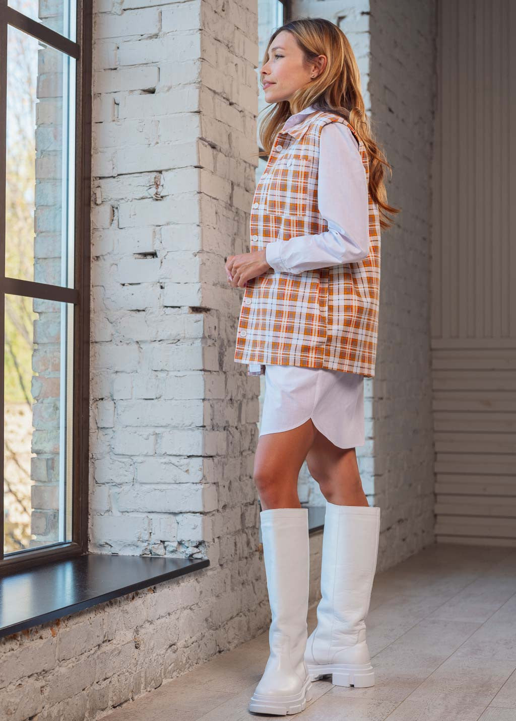 Теплий жилет з кишенями