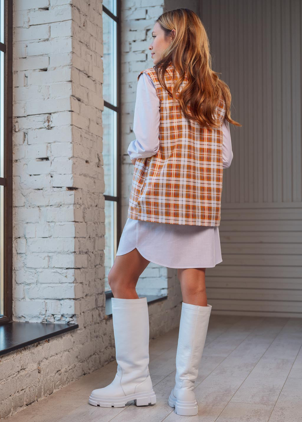 Теплий жилет з кишенями