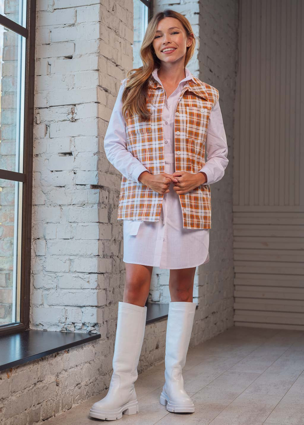 Теплий жилет з кишенями