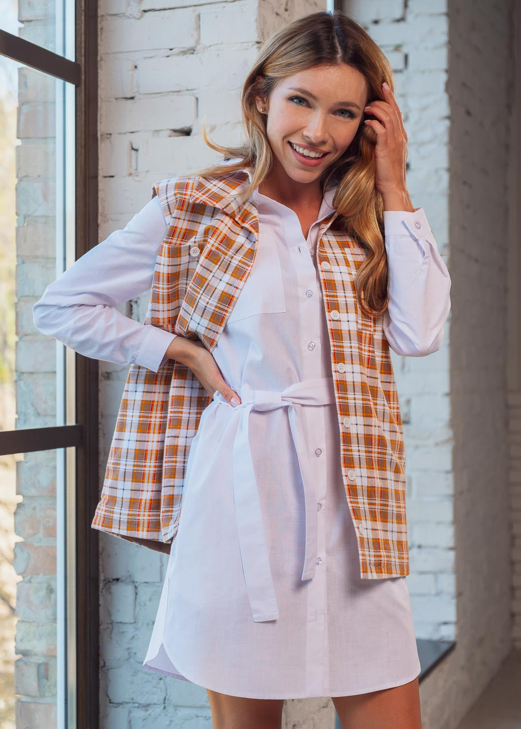 Теплий жилет з кишенями