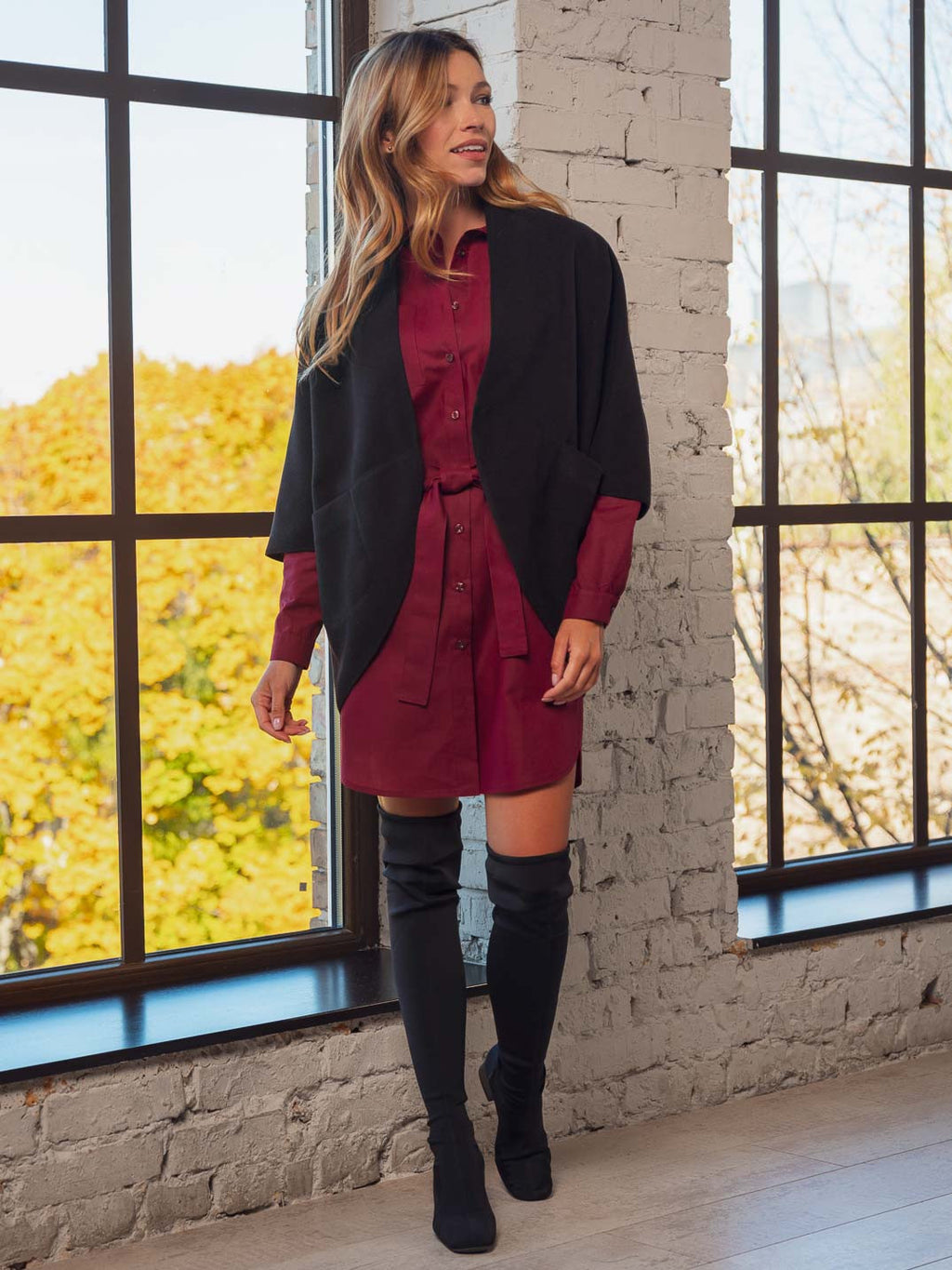 Теплий жилет з кишенями