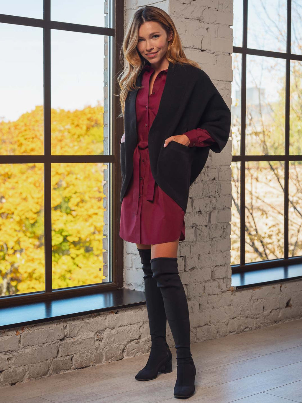 Теплий жилет з кишенями