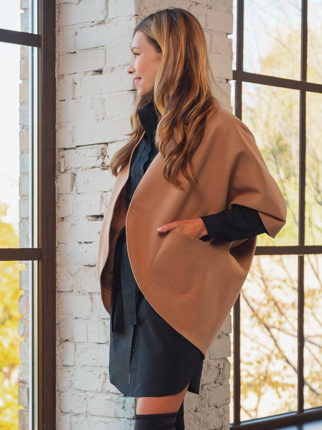 Теплий жилет з кишенями