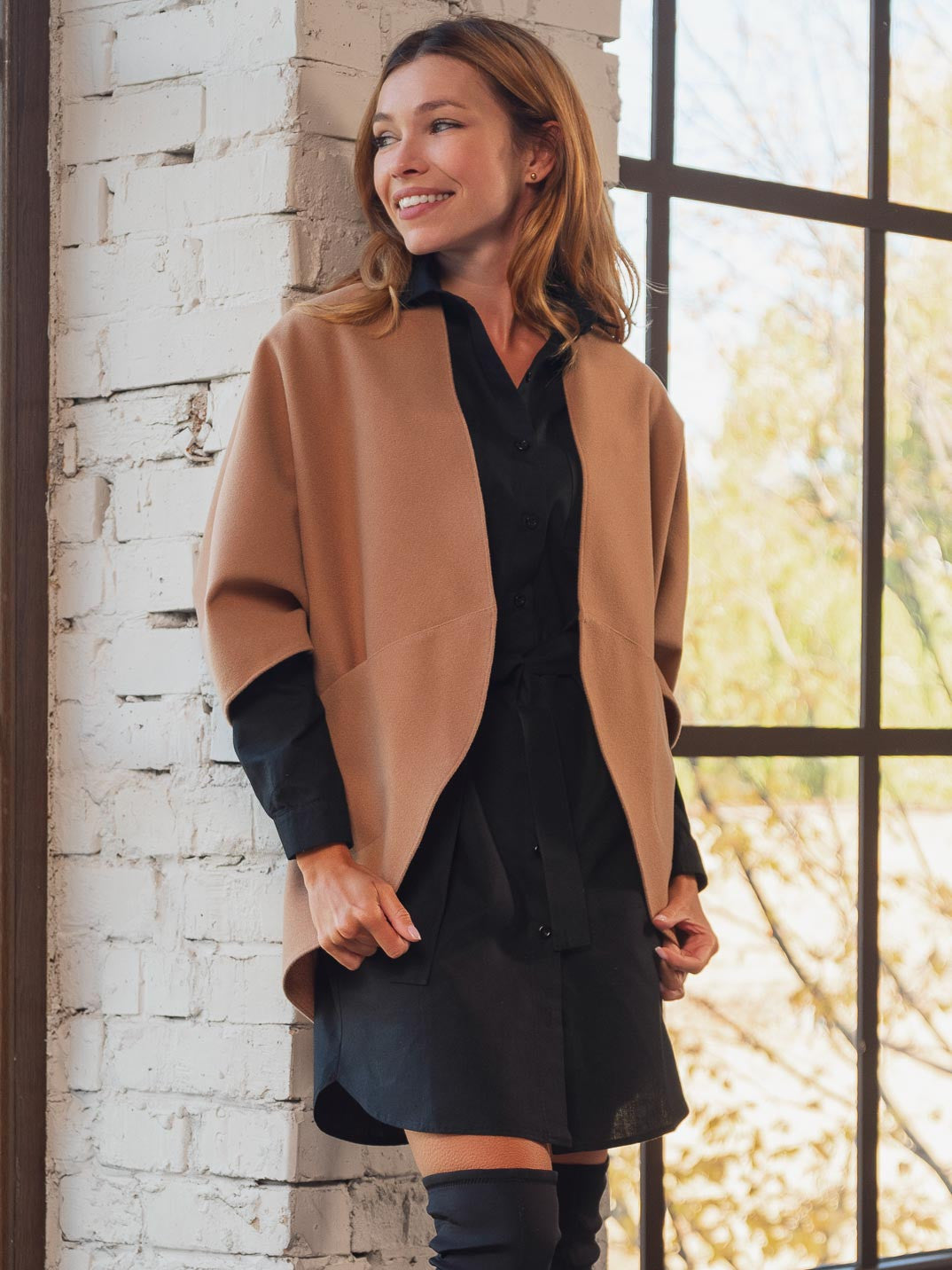 Теплий жилет з кишенями