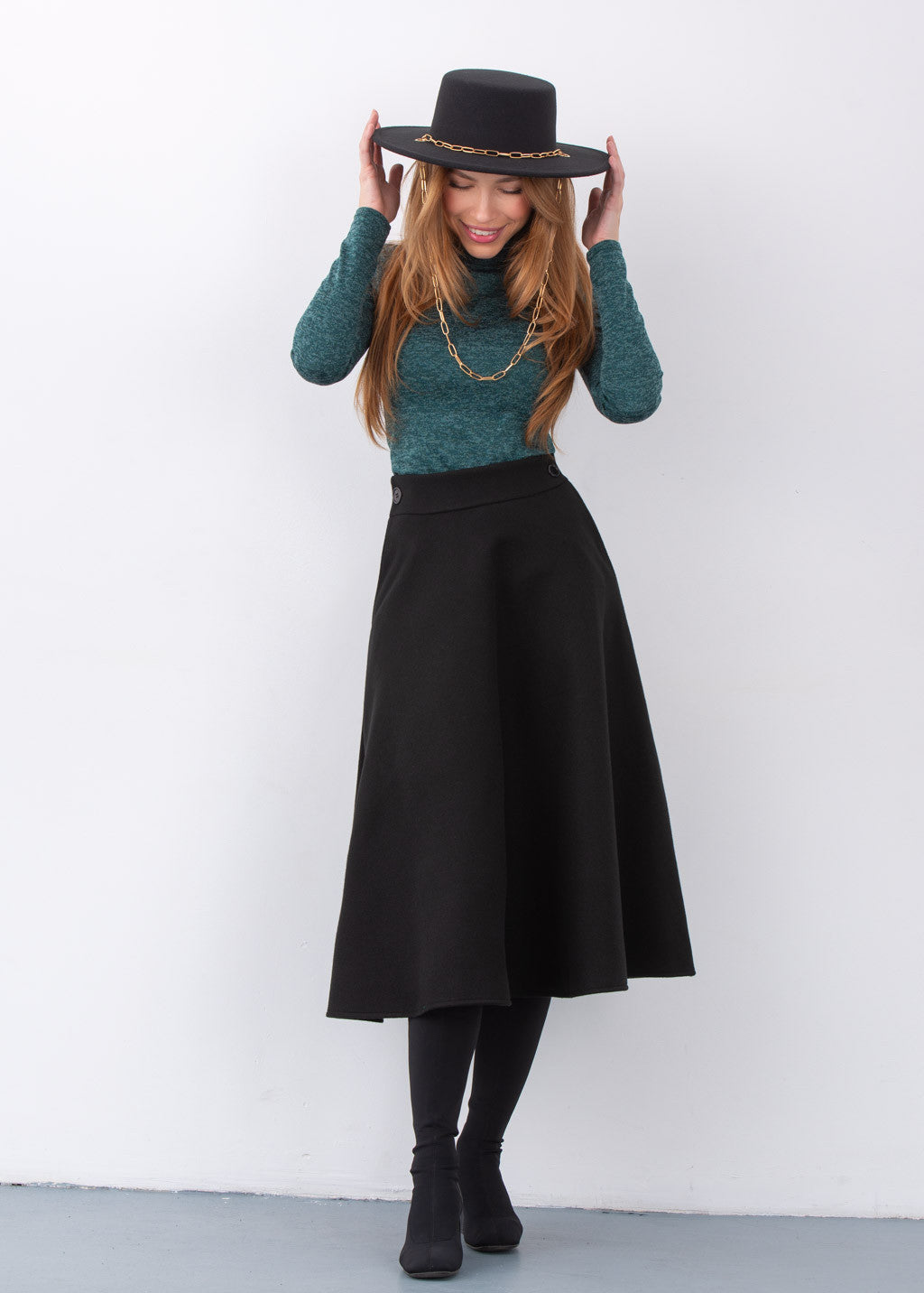 Тепла широка спідниця з кишенями