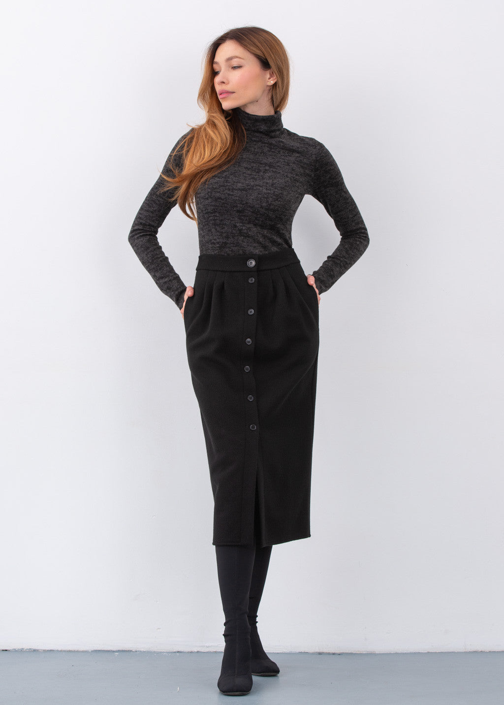 Тепла спідниця з кишенями