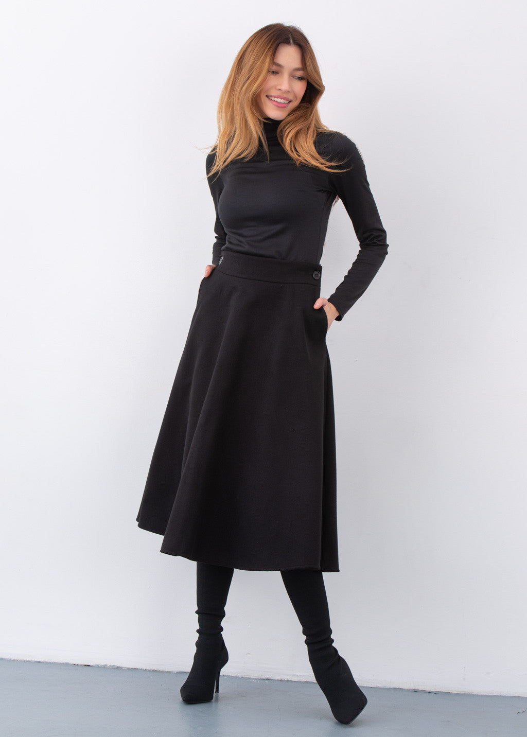 Тепла широка спідниця з кишенями