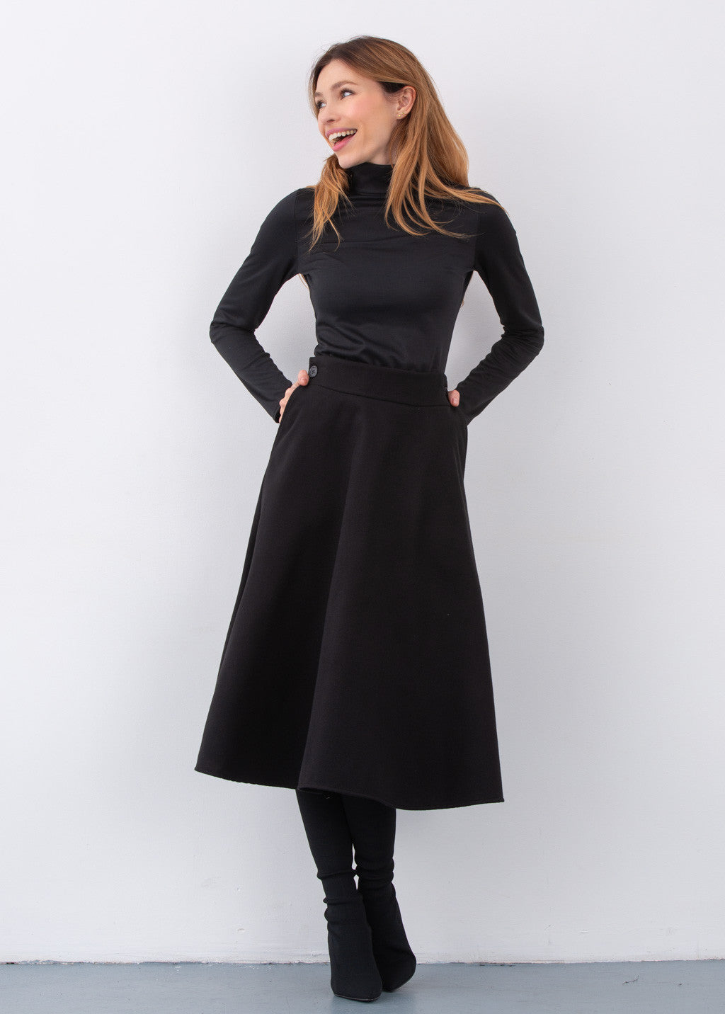 Тепла широка спідниця з кишенями