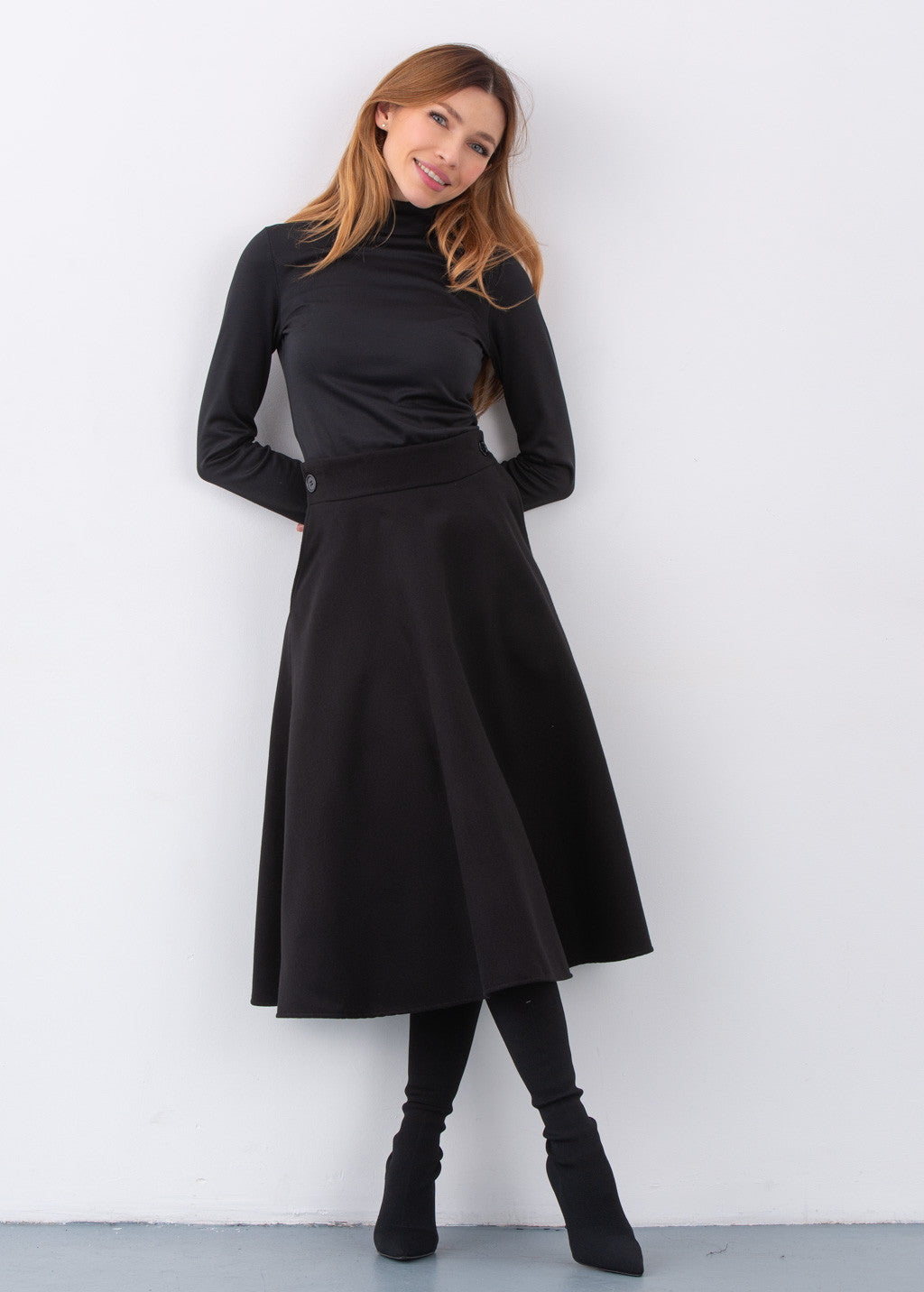 Тепла широка спідниця з кишенями