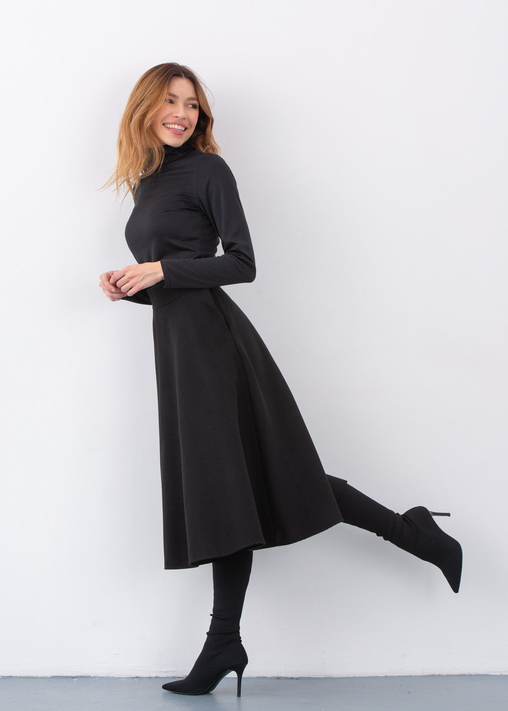 Тепла широка спідниця з кишенями