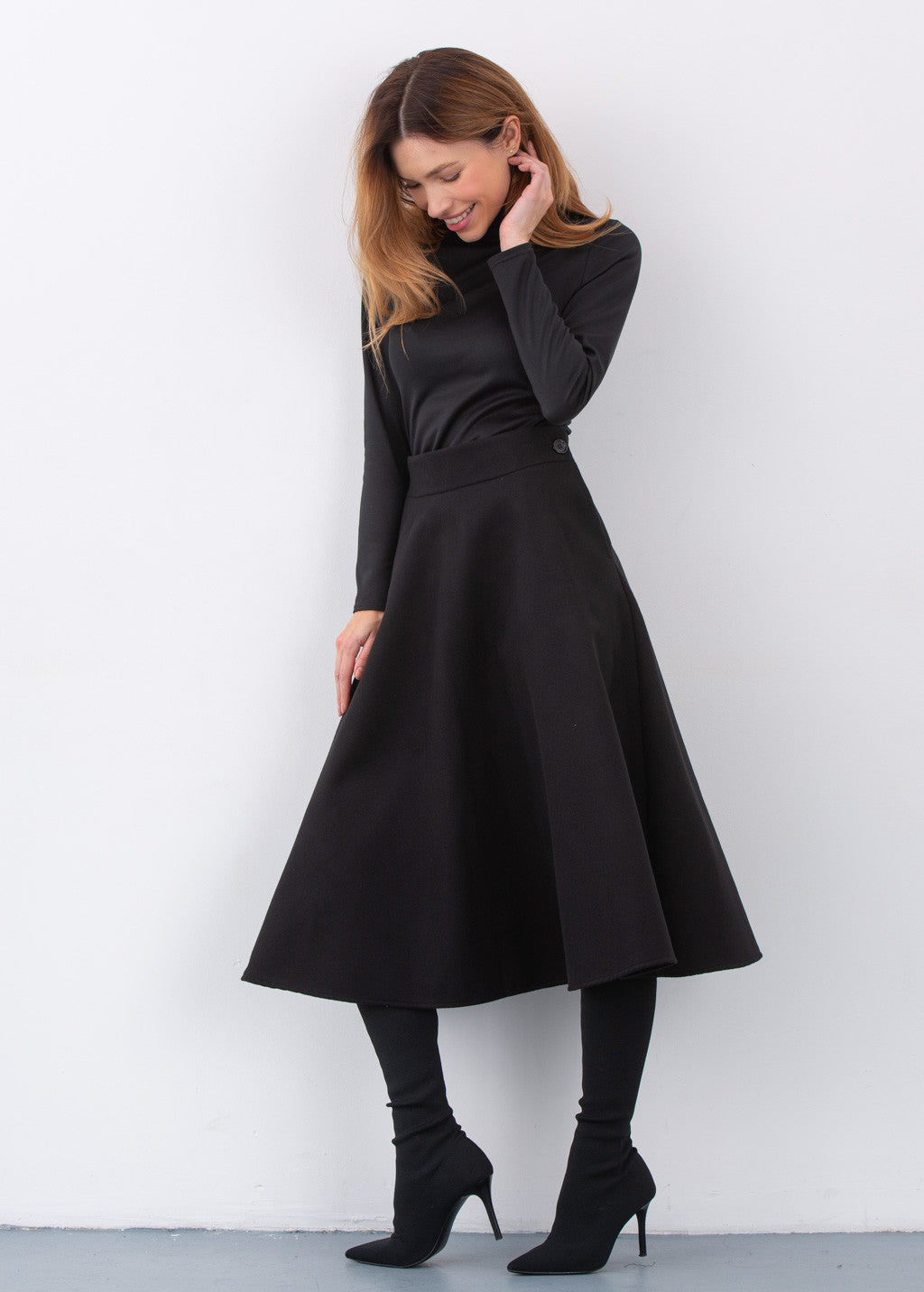 Тепла широка спідниця з кишенями