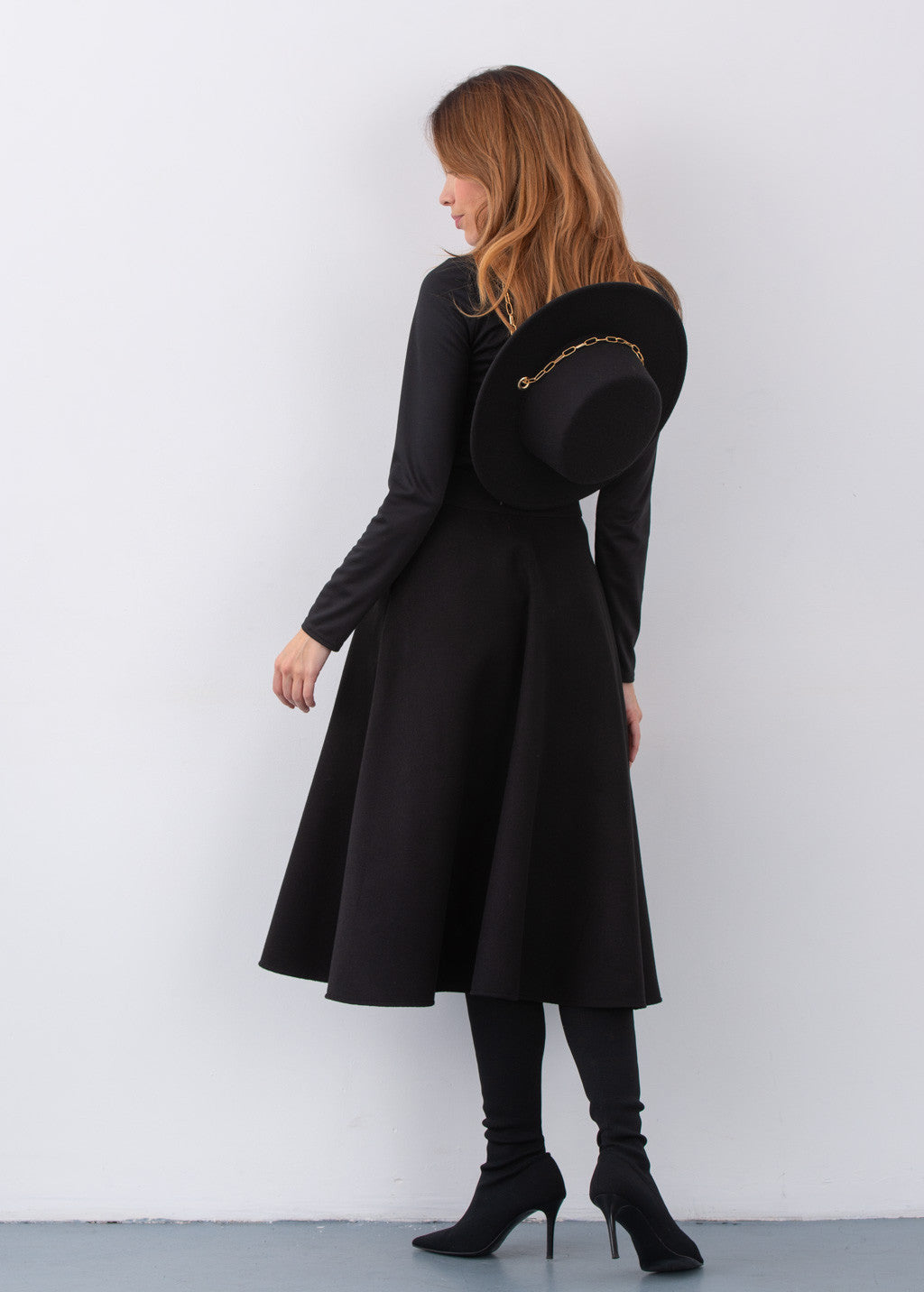 Тепла широка спідниця з кишенями