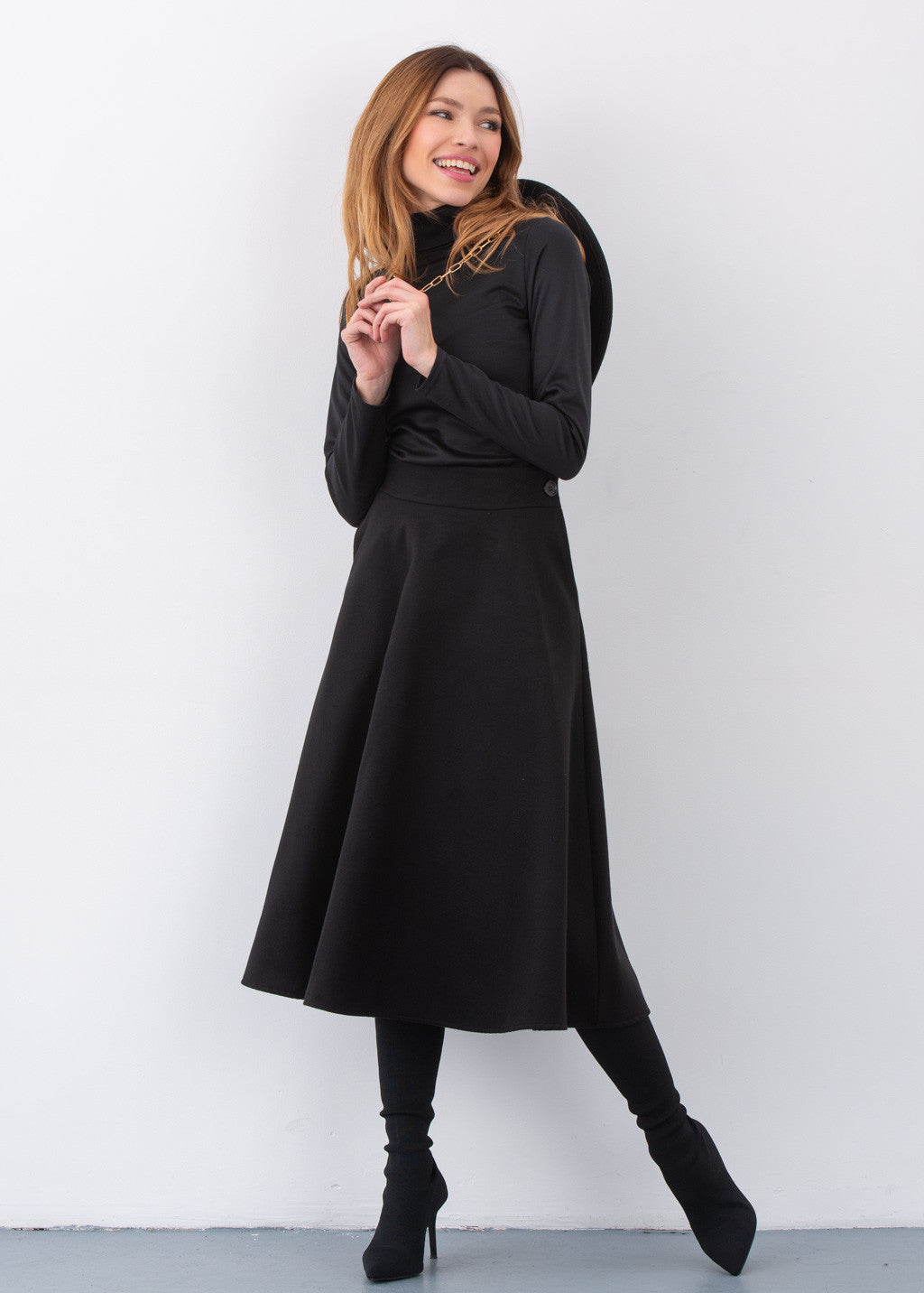 Тепла широка спідниця з кишенями