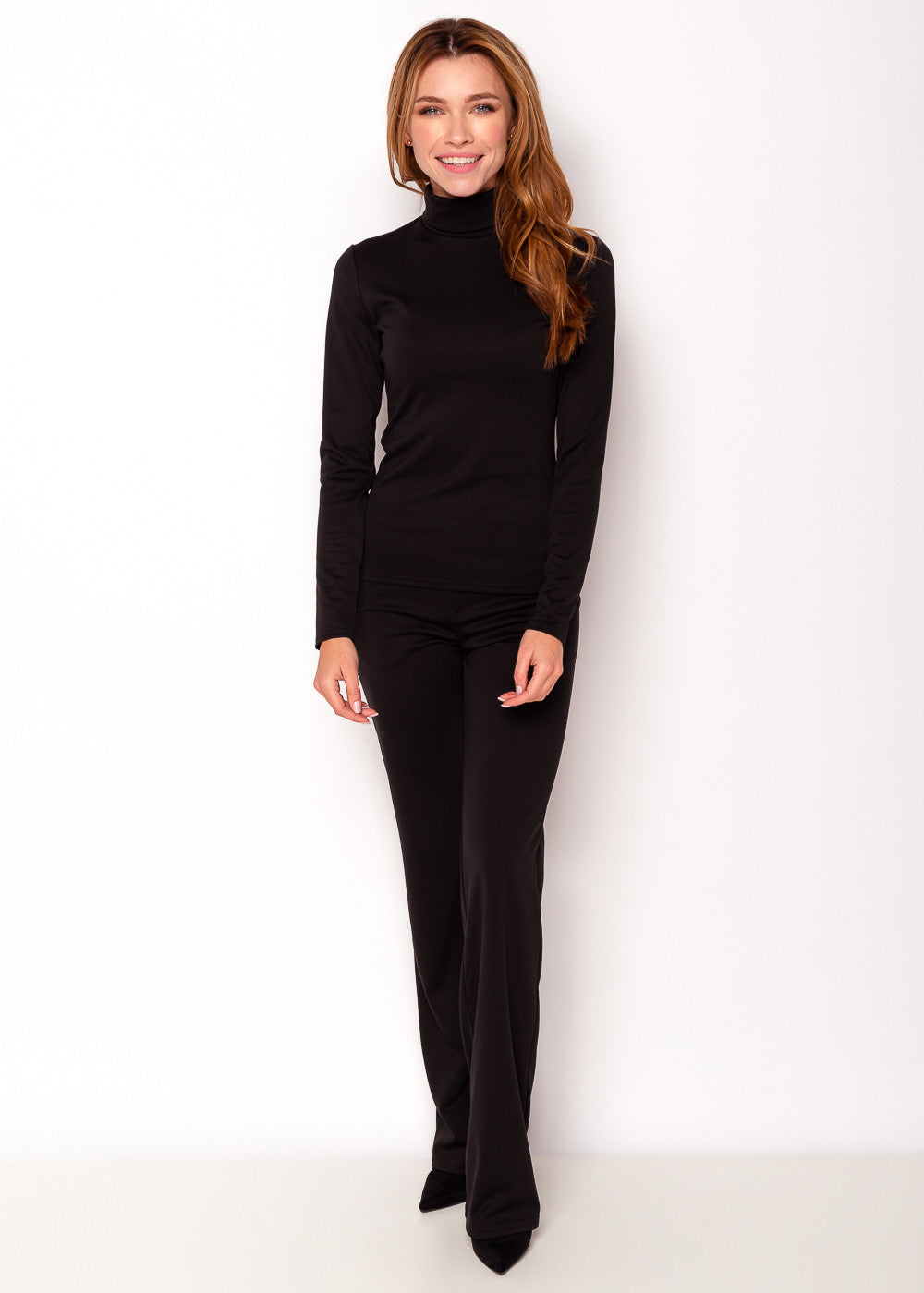 Трикотажний брючний костюм