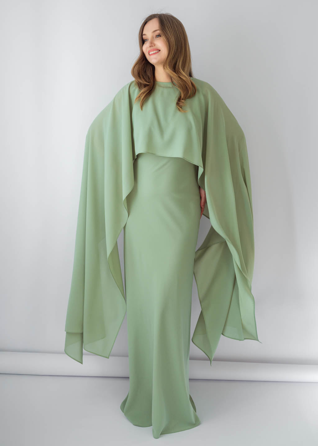 Довга шифонова сукня з кейпом в кольорі Sage Green